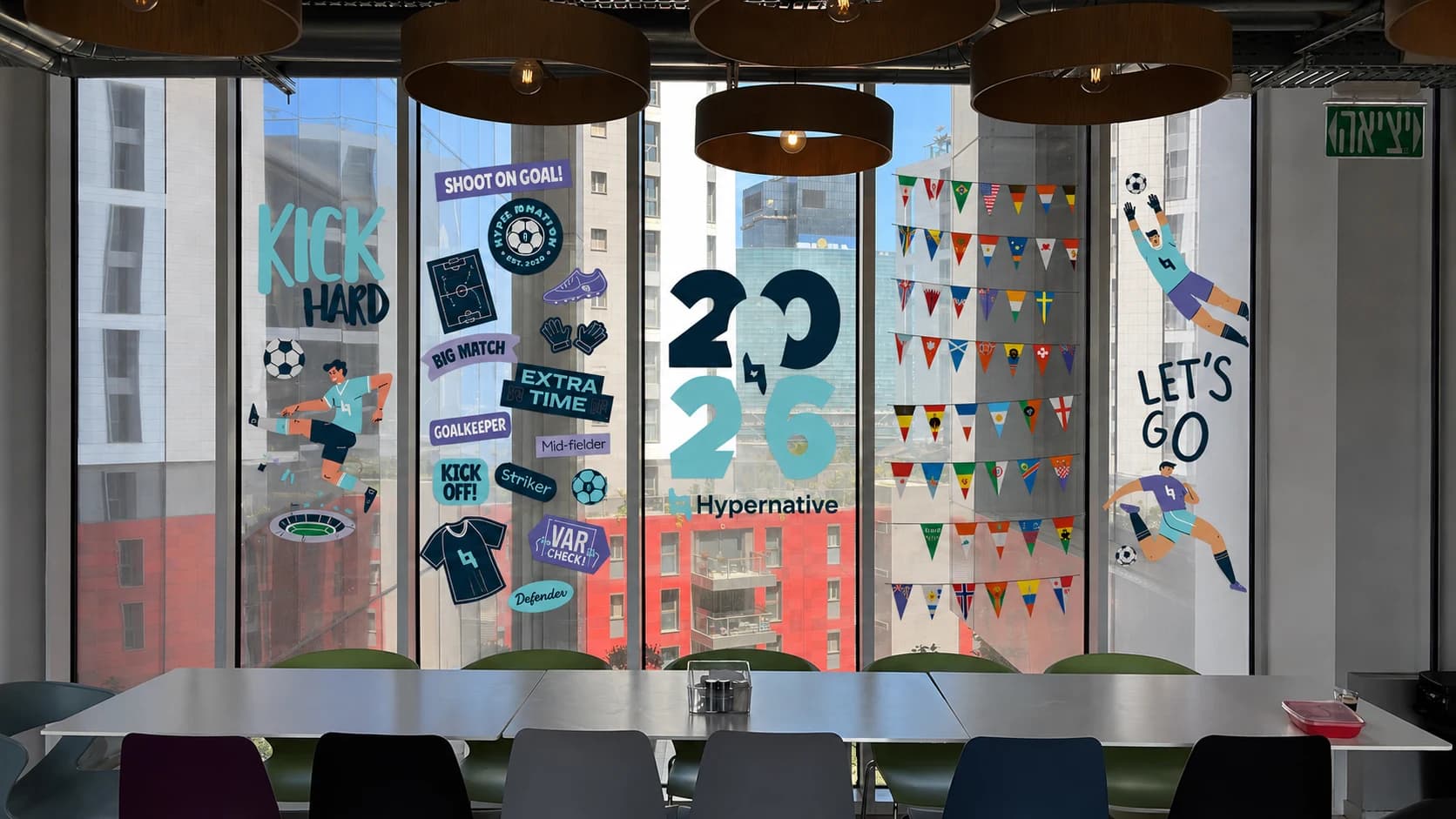 Hyper World Cup window graphics across an office dining area (mockup)