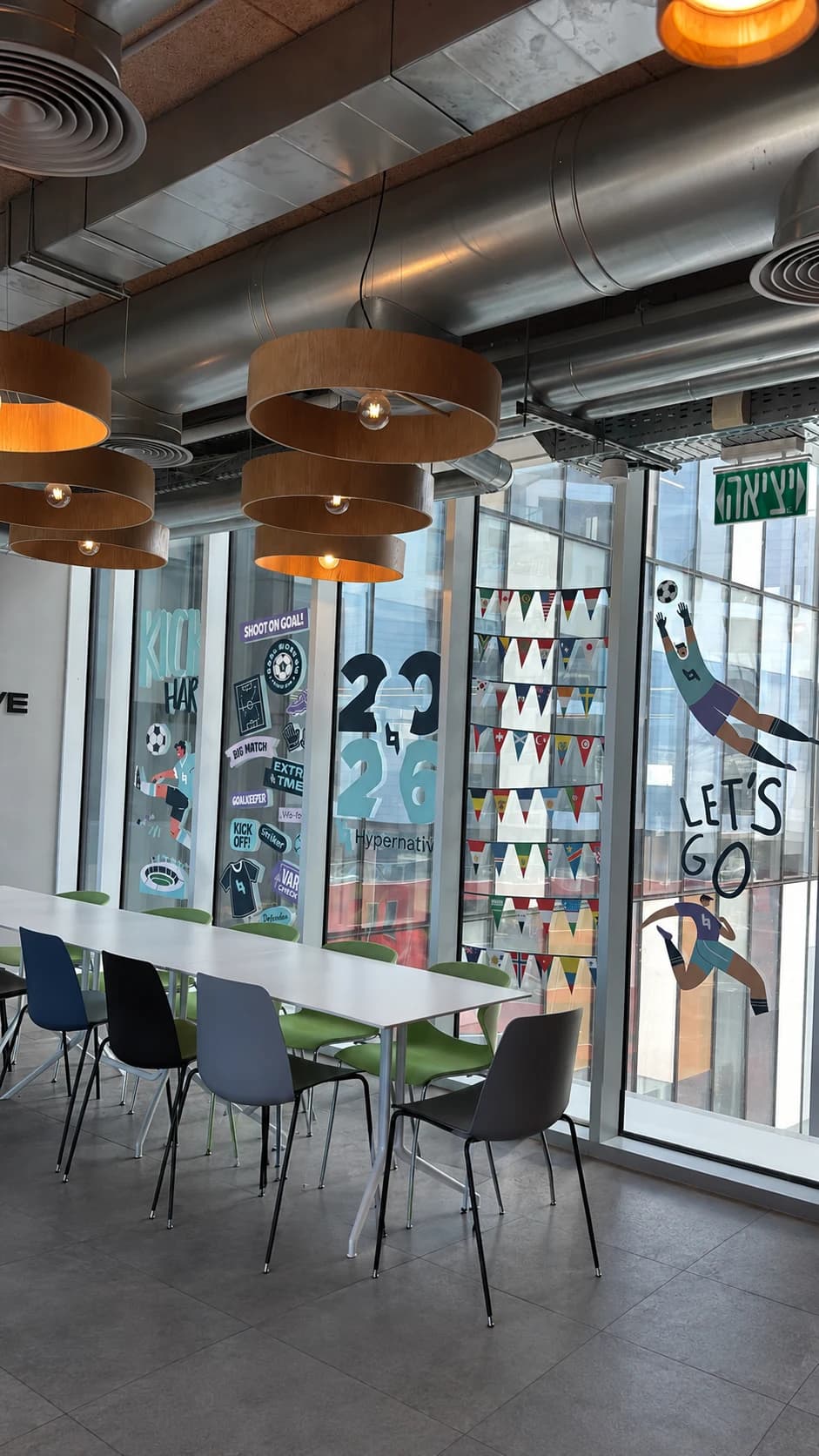 Window graphics seen along the length of the office (mockup)